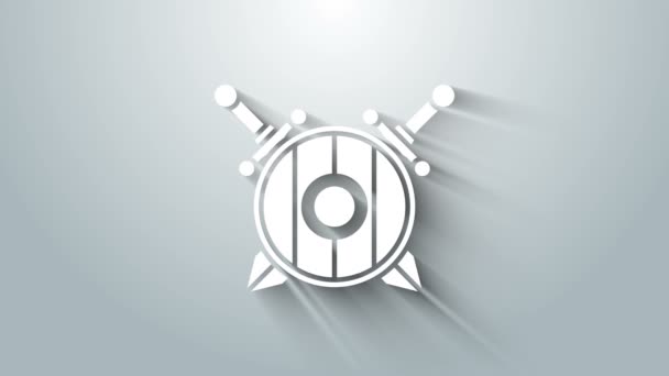 Escudo de madera medieval blanco con icono de espadas cruzadas aisladas sobre fondo gris. Animación gráfica de vídeo 4K — Vídeo de stock