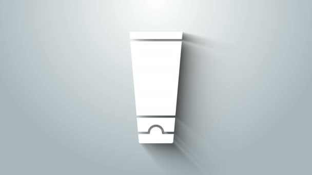 Icona bianca crema o lozione tubo cosmetico isolato su sfondo grigio. Prodotti per la cura del corpo per uomini. Animazione grafica 4K Video motion — Video Stock