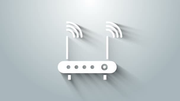 Witte Router en wi-fi symbool pictogram geïsoleerd op grijze achtergrond. Draadloze ethernet modem router. Computertechnologie internet. 4K Video motion grafische animatie — Stockvideo