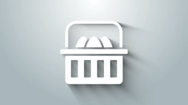 Paskalya yumurtası ikonlu beyaz sepet gri arka planda izole edilmiş. Mutlu Paskalyalar. 4K Video hareketli grafik canlandırması