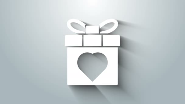 Weiße Geschenkschachtel und Herzsymbol isoliert auf grauem Hintergrund. 8. März. Internationaler glücklicher Frauentag. 4K Video Motion Grafik Animation — Stockvideo