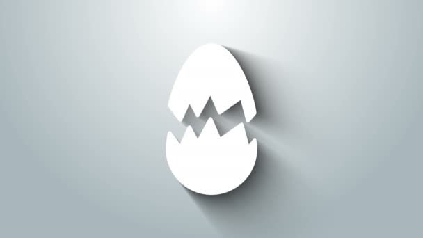 Biała ikona rozbitego jajka odizolowana na szarym tle. Szczęśliwej Wielkanocy. 4K Animacja graficzna ruchu wideo — Wideo stockowe