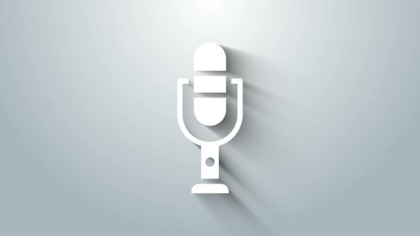 White Microphone icon isolated on grey background. On air radio mic microphone. Speaker sign. 4K Video motion graphic animation — Stock Video