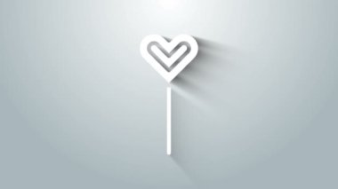 Beyaz lolipop simgesi gri arkaplanda izole edildi. Yemek, lezzetli bir sembol. 4K Video hareketli grafik canlandırması