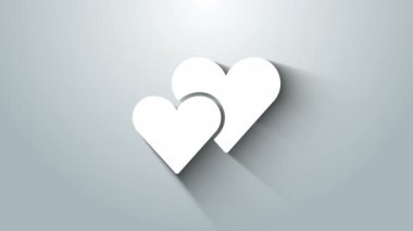 Beyaz Kalp simgesi gri arkaplanda izole edildi. Romantik sembol, bağlanma, tutku ve düğün. Sevgililer Günü sembolü. 4K Video hareketli grafik canlandırması