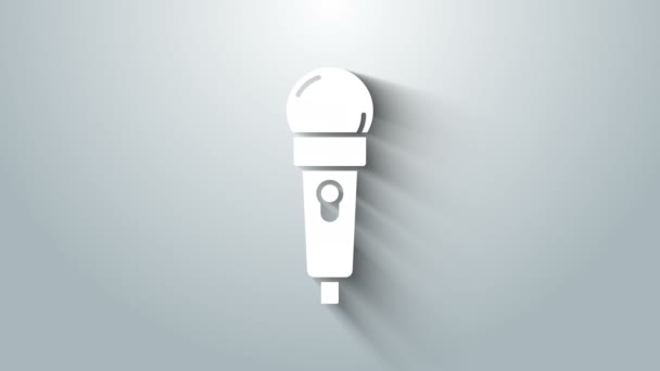 White Microphone icon isolated on grey background. On air radio mic microphone. Speaker sign. 4K Video motion graphic animation — Stock Video