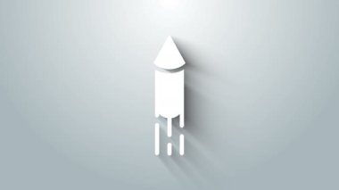 Beyaz Firework roket ikonu gri arka planda izole edildi. Eğlence partisi anlayışı. Patlayıcı havai fişek sembolü. 4K Video hareketli grafik canlandırması