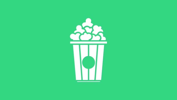 白色爆米花纸盒图标孤立在绿色背景.爆米花桶4K视频运动图形动画 — 图库视频影像