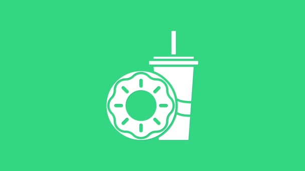 Wit papieren glas met drinkstro en donut icoon geïsoleerd op groene achtergrond. Soda aqua bordje. Fastfood menu. 4K Video motion grafische animatie — Stockvideo