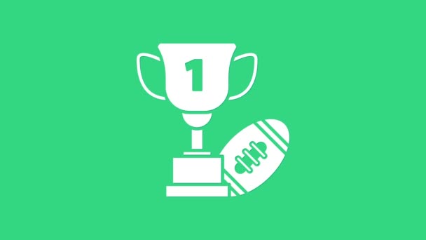 White Award cup and American football ball icon isolated on green background. Winner trophy symbol. Championship or competition trophy. 4K Video motion graphic animation — Stock Video