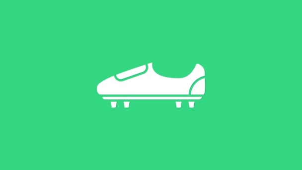 Zapatillas de fútbol blanco o de fútbol con pinchos icono aislado sobre fondo verde. Bota de fútbol americano. Animación gráfica de vídeo 4K — Vídeos de Stock