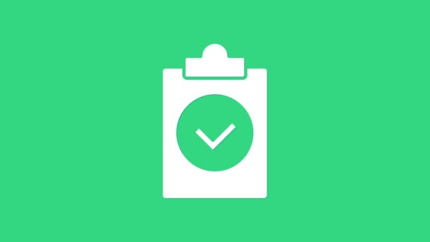 White Completed task icon isolated on green background. Compliance inspection approved. Checklist sign. Certified document symbol. 4K Video motion graphic animation — Stock Video