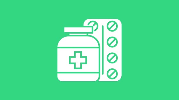 Botella de medicina blanca y pastillas icono aislado sobre fondo verde. Signo de la píldora. Diseño de farmacia. Animación gráfica de vídeo 4K — Vídeos de Stock