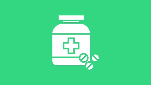 白色药瓶和药丸图标隔离在绿色背景.瓶装药丸标志。药房设计。4K视频运动图形动画 — 图库视频影像