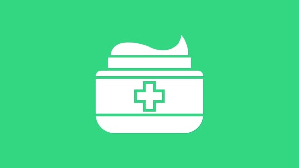 Vit salva grädde röret medicin ikon isolerad på grön bakgrund. Rör, behållare, tandkräm, krämskylt. 4K Video motion grafisk animation — Stockvideo