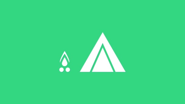 Barraca turística branca com ícone de fogo de madeira isolado no fundo verde. Símbolo de acampamento. Animação gráfica em movimento de vídeo 4K — Vídeo de Stock