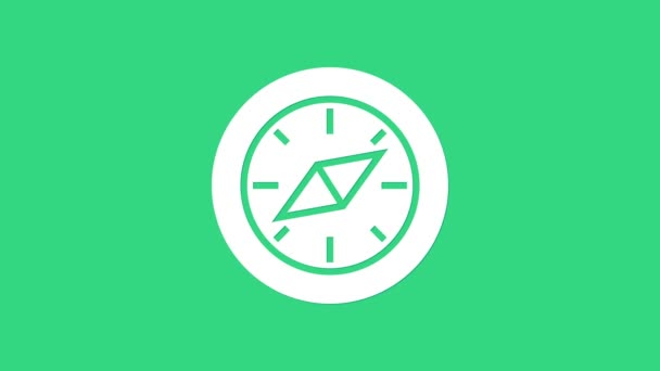Fehér iránytű ikon elszigetelt zöld alapon. Windrose navigációs szimbólum. Szélrózsa jel. 4K Videó mozgás grafikus animáció — Stock videók