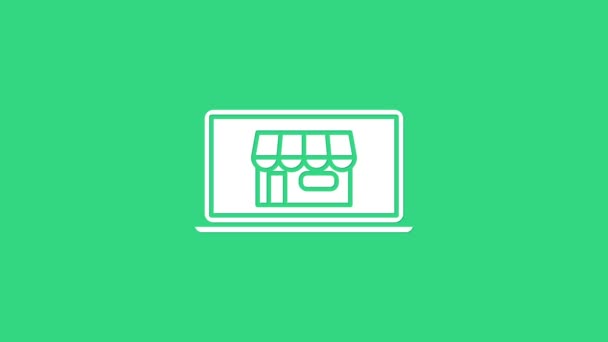 Bâtiment commercial blanc sur l'icône de l'ordinateur portable de l'écran isolé sur fond vert. Concept e-commerce, e-business, marketing d'affaires en ligne. Animation graphique de mouvement vidéo 4K — Video