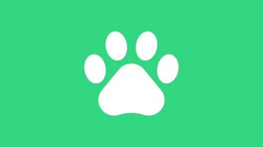 Beyaz Pençe yazdırma simgesi yeşil arkaplanda izole edildi. Köpek ya da kedi pençesi izi. Hayvan izleri. 4K Video hareketli grafik canlandırması