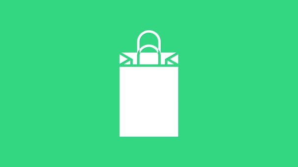 Icono de la bolsa de compras White Paper aislado sobre fondo verde. Firma del paquete. Animación gráfica de vídeo 4K — Vídeos de Stock