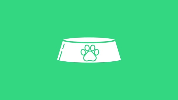 白色宠物狗的食物碗,猫或狗的图标隔离在绿色背景.狗爪或猫爪印。4K视频运动图形动画 — 图库视频影像