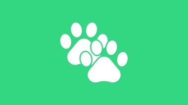 Beyaz Pençe yazdırma simgesi yeşil arkaplanda izole edildi. Köpek ya da kedi pençesi izi. Hayvan izleri. 4K Video hareketli grafik canlandırması