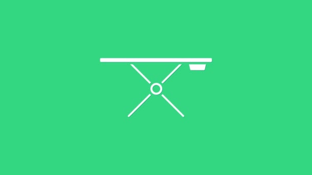 Witte strijkplank pictogram geïsoleerd op groene achtergrond. 4K Video motion grafische animatie — Stockvideo