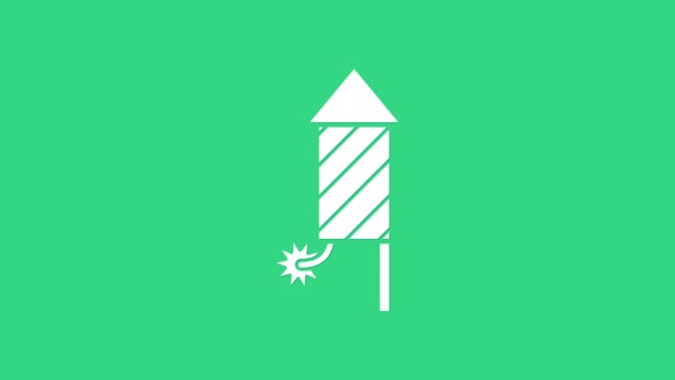 Icono de cohete de fuegos artificiales blanco aislado sobre fondo verde. Concepto de fiesta divertida. Explosivo símbolo pirotécnico. Animación gráfica de vídeo 4K — Vídeos de Stock