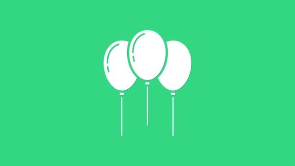 Білі кульки зі стрічкою ізольовані на зеленому тлі. 4K Відео рух графічна анімація — стокове відео