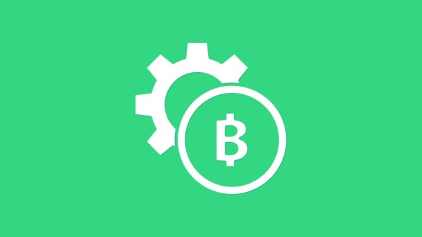 White Cryptocurrency coin Bitcoin icon isolated on green background. Gear and Bitcoin setting. Blockchain based secure crypto currency. 4K Video motion graphic animation — Stock Video