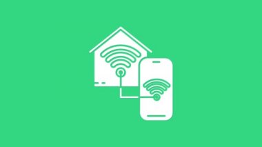 Yeşil arka planda kablosuz ağ ikonu olan White Smart evi. Uzaktan kumanda. 4K Video hareketli grafik canlandırması