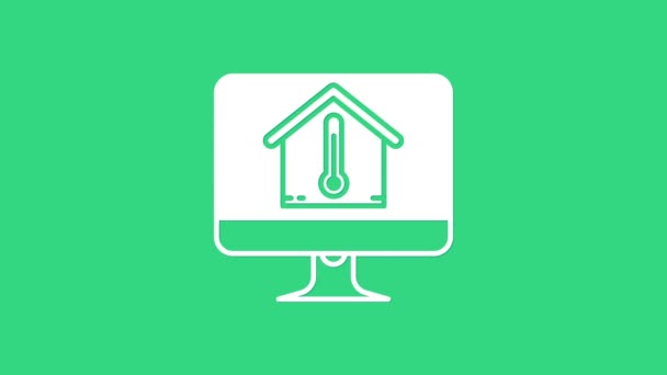 Monitor de computador branco com ícone de temperatura da casa isolado em fundo verde. Ícone do termómetro. Animação gráfica em movimento de vídeo 4K — Vídeo de Stock