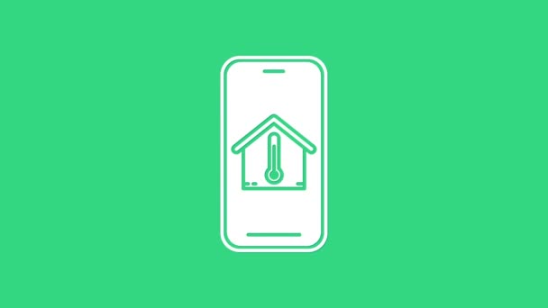 Witte mobiele telefoon met huis temperatuur pictogram geïsoleerd op groene achtergrond. Thermometer icoon. 4K Video motion grafische animatie — Stockvideo