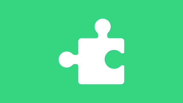 Biały Kawałek ikony puzzle izolowane na zielonym tle. Nowoczesne mieszkanie, biznes, marketing, finanse, internet. 4K Animacja graficzna ruchu wideo — Wideo stockowe