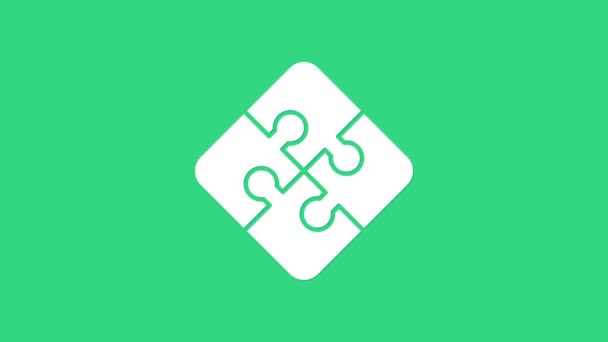 Fehér darab puzzle ikon elszigetelt zöld háttérrel. Üzleti, marketing, pénzügy, sablon, elrendezés, infografika, internet koncepció. 4K Videó mozgás grafikus animáció — Stock videók