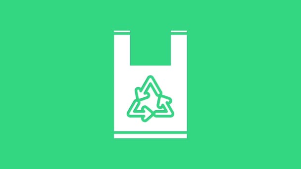 Bolsa de plástico blanco con icono de reciclaje aislado sobre fondo verde. Bolsa con símbolo de reciclaje. Animación gráfica de vídeo 4K — Vídeos de Stock