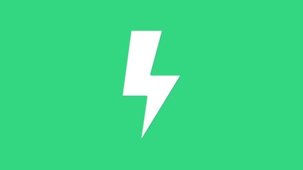 Witte bliksemschicht pictogram geïsoleerd op groene achtergrond. Vlambordje. Laad flash icoon op. Een bliksemschicht. Verlichtingsstaking. 4K Video motion grafische animatie — Stockvideo