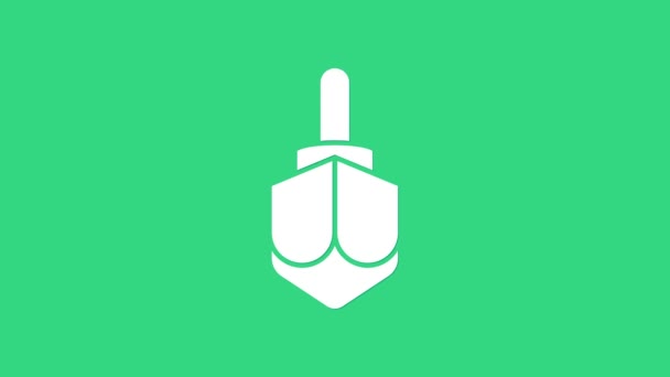 Fehér Hanuka dreidel ikon elszigetelt zöld alapon. 4K Videó mozgás grafikus animáció