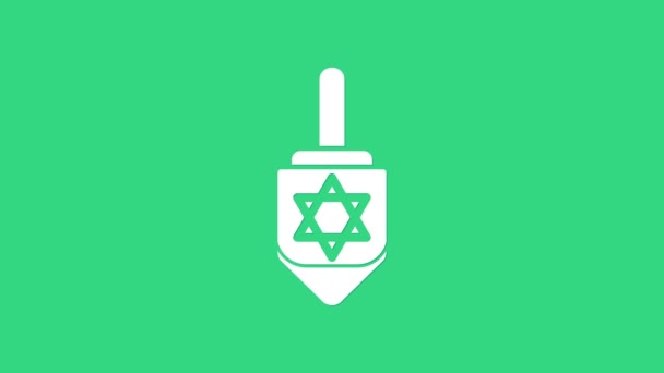 Icono de Hanukkah dreidel blanco aislado sobre fondo verde. Animación gráfica de vídeo 4K — Vídeo de stock