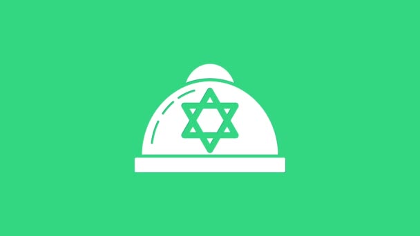 Біла єврейська кіпа з зіркою голубого ікону, ізольованою на зеленому тлі. Єврейський Ярмульський капелюх. 4K Відеографічна анімація — стокове відео