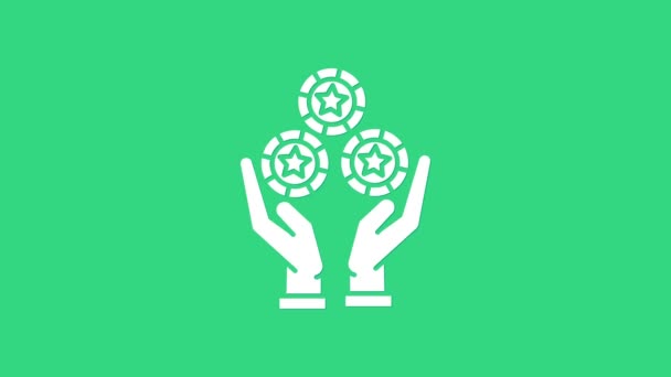White Hand drží kasino čipy ikony izolované na zeleném pozadí. Hazard v kasinu. Grafická animace pohybu videa 4K — Stock video