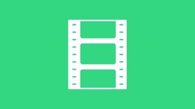 Beyaz Oyun Görüntü simgesi yeşil arkaplanda izole edildi. Film şeridi tabelası. 4K Video hareketli grafik canlandırması