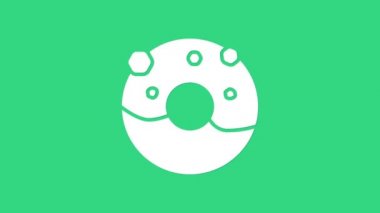 Yeşil arka planda izole edilmiş tatlı simgeli beyaz çörek. 4K Video hareketli grafik canlandırması