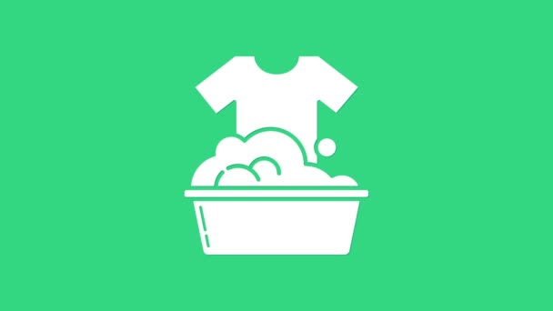 White Plastic basin with soap suds icon isolated on green background. Bowl with water. Washing clothes, cleaning equipment. 4K Video motion graphic animation — Stock Video