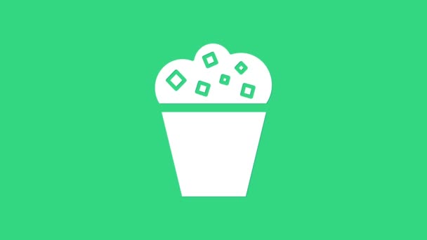 Palomitas blancas en caja de cartón icono aislado sobre fondo verde. Caja de palomitas de maíz. Animación gráfica de vídeo 4K — Vídeo de stock