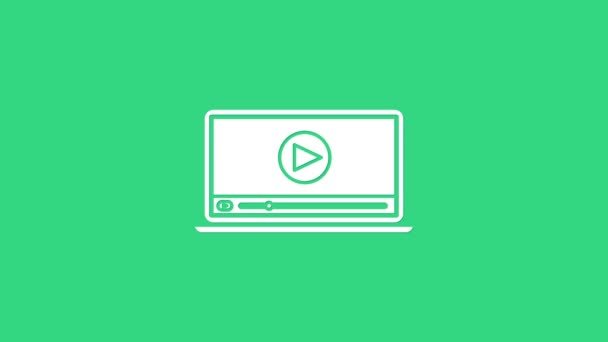 Blanc en ligne jouer icône vidéo isolé sur fond vert. Ordinateur portable et bande de film avec panneau de lecture. Animation graphique de mouvement vidéo 4K — Video