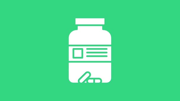白色药瓶和药丸图标隔离在绿色背景.瓶装药丸标志。药房设计。4K视频运动图形动画 — 图库视频影像