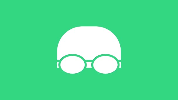 Weiße Brille und Badekappe isoliert auf grünem Hintergrund. Badekappe und Schwimmbrille. Tauchausrüstung. 4K Video Motion Grafik Animation — Stockvideo