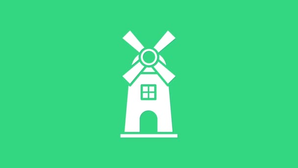 Weiße Windmühle Symbol isoliert auf grünem Hintergrund. 4K Video Motion Grafik Animation — Stockvideo