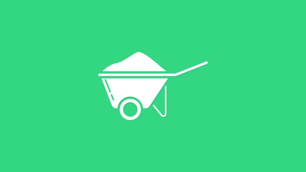 White Wheelbarrow with dirt icon isolated on green background. Tool equipment. Agriculture cart wheel farm. 4K Video motion graphic animation — Stock Video